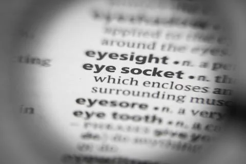 Word or phrase eye socket in a dictionary. Stock Photos