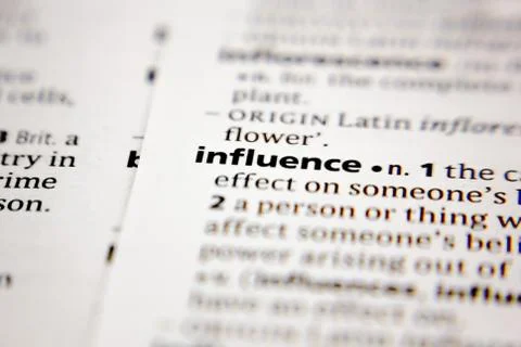 Word or phrase influence in a dictionary. Stock Photos