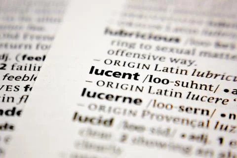 Word or phrase lucent in a dictionary. Stock Photos