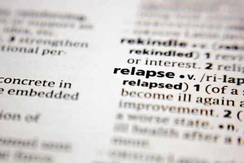 Word or phrase relapse in a dictionary. Stock Photos