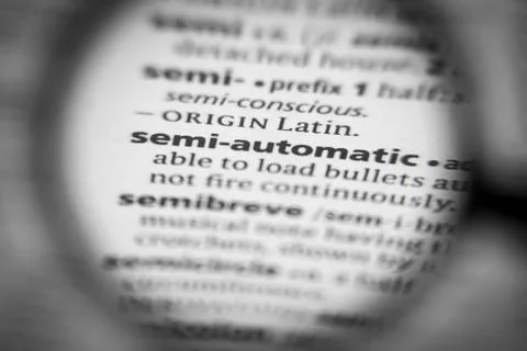 Word or phrase semi-automatic in a dictionary. Stock Photos