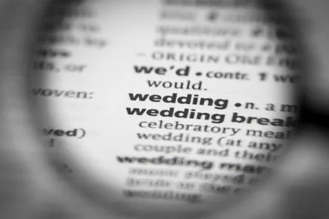 Word or phrase wedding in a dictionary. Stock Photos