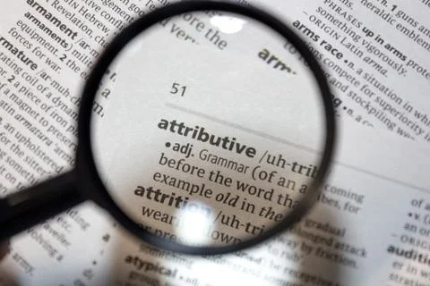 The word of phrase - attributive - in a dictionary. Stock Photos
