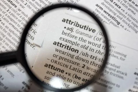 The word of phrase - attrition - in a dictionary. Stock Photos