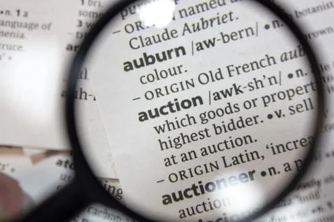 The word of phrase - auction - in a dictionary. Stock Photos