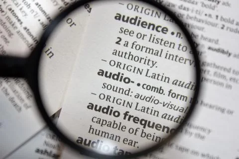 The word of phrase - audio - in a dictionary. Stock Photos