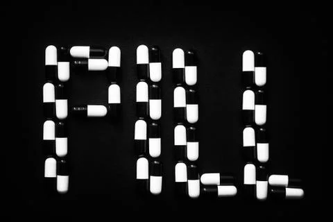 The Word Pill Made up of Tablets Stock Photos