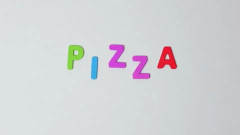 The word pizza is made of moving colored wooden letters. Pizza word or lettering Stock Footage 242449802