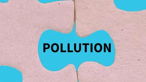 The word pollution in the gap of the puzzle Stock Photos
