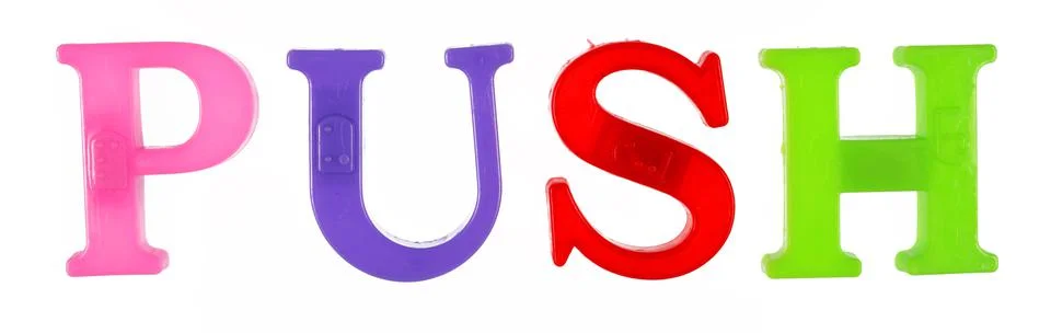 The word push is lined with multicolored plastic letters isolated Stock Photos