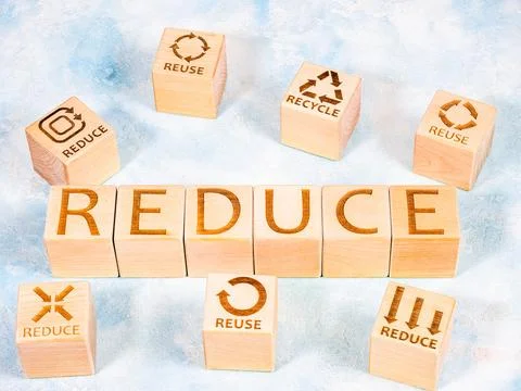 Word REDUCE as resources consumption concept Stock Photos