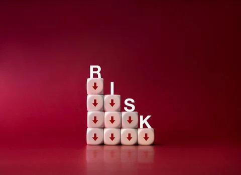 Word "RISK" on decrease business graph step, finance diagram with down arro.. Stock Photos