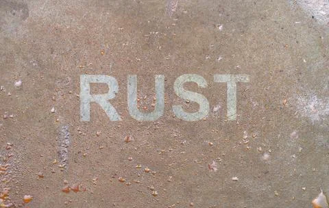Word RUST rusting pattern rust stainless decay, resistant weather corrosive g Stock Photos