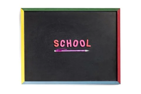 Word school using plastic alphabet on black board Stock Photos