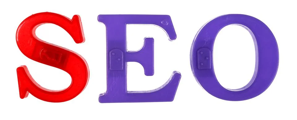 The word seo is lined with multi-colored plastic letters Stock Photos