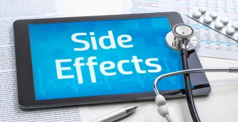The word Side Effects on the display of a tablet Stock Photos