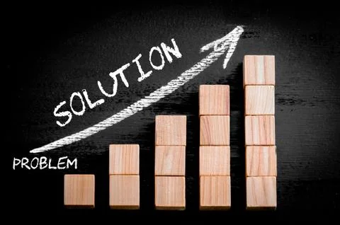Word Solution on ascending arrow above bar graph of Wooden small cubes isolat Stock Photos