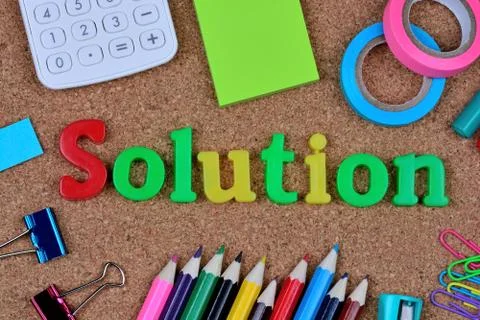 The word Solution on cork background Stock Photos