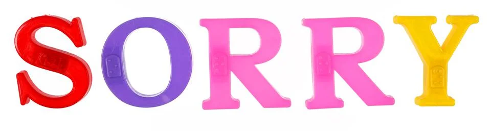 The word sorry is lined with multi-colored plastic letters, Stock Photos