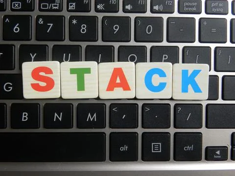 Word Stack on keyboard background Stock Photos