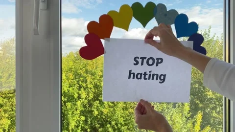 Word Stop hating under rainbow. Stock Footage 162055863