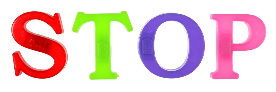 The word stop is lined with multi-colored plastic letters, Foto stock