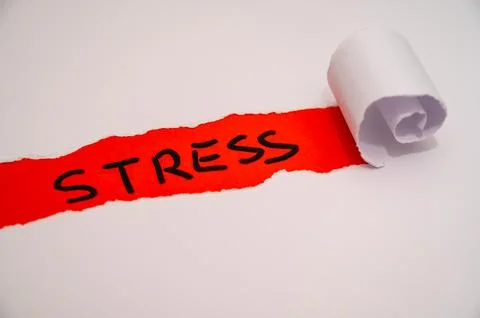 Word Stress on red surface. Stock Photos
