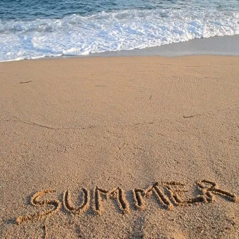 The word Summer written in the sand Stock Footage 69496360