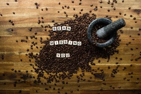 Word Tiles Coffee Bean Missing You Light Timber Background Stock Photos