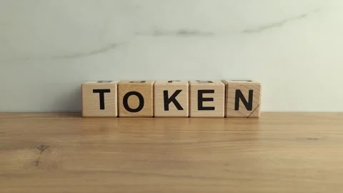 Word token from wooden blocks Stock Footage 243372472