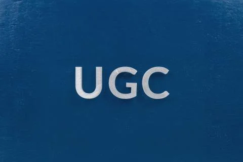 The word ugc - user generated content - laid by white silver metal letters on Photos