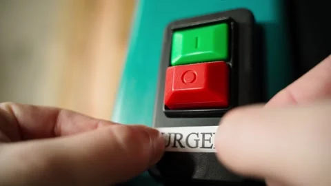 The word URGENT is glued under the large on and off buttons. Red and green Stock Footage 324181115