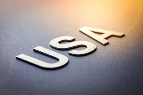 Word USA written with white solid letters Stock Photos