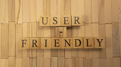 The word user friendly was created from wooden cubes. Technology and life Stock Photos
