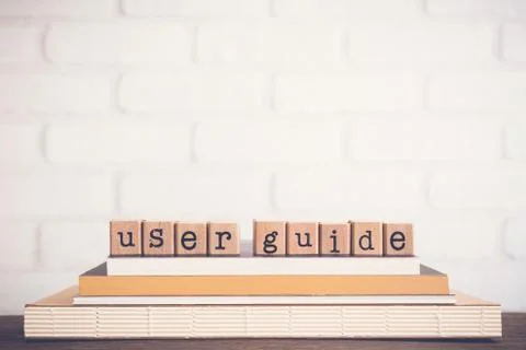 The word User guide and copy space background. Stock Photos