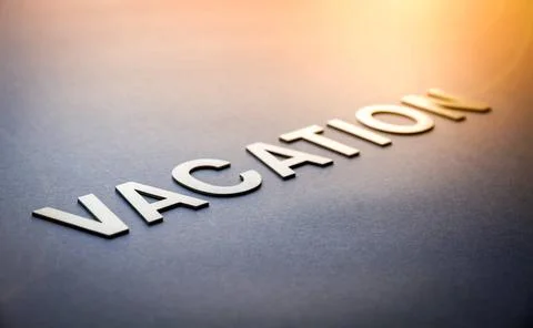  Word vacation written with white solid letters Word vacation written with... Foto stock