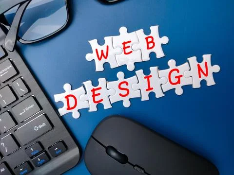 The word WEB DESIGN on a blue background. Stock Photos