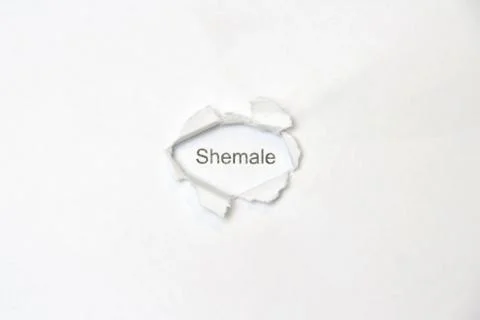 Word on white isolated background through the wound hole in the paper. Stock Photos