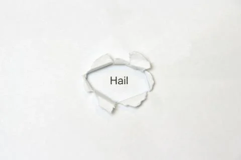 Word on white isolated background through the wound hole in the paper. Stock Photos