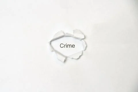 Word on white isolated background through the wound hole in the paper. Stock Photos
