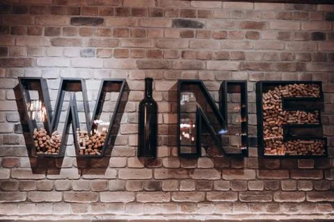Word wine on the wall Stock Photos