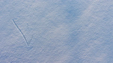 The word Winter appears on the snow Stock Footage 87782780