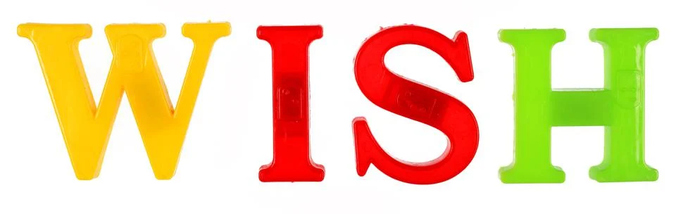 The word Wish is lined with multi-colored plastic letters, Foto stock