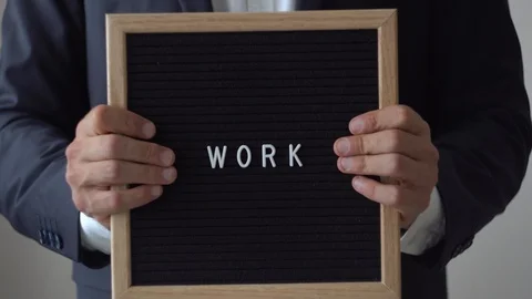 Word Work from Letters on Text Board in Anonymous Businessman Hands Stock Footage 91399694