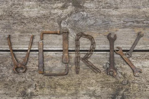 Word WORK made of rusty hand tools Stock Photos