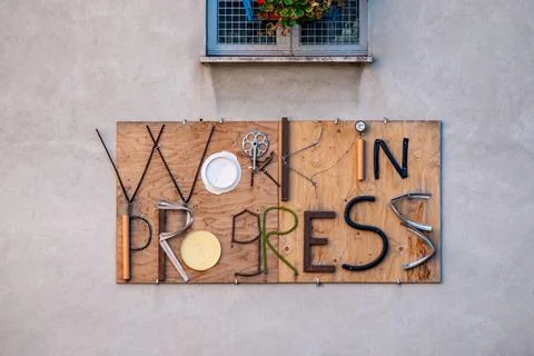 The word "Work in progress" created with recycled objects Stock Photos
