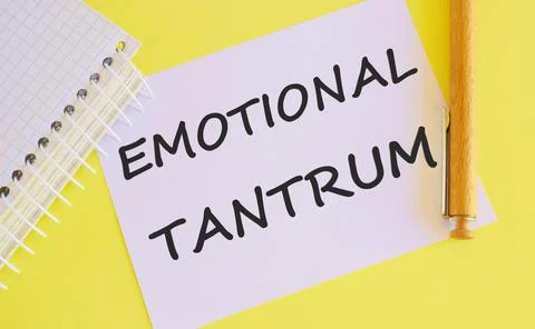 Word writing Emotional tantrum .Concept of emotional distress characterized b Stock Photos