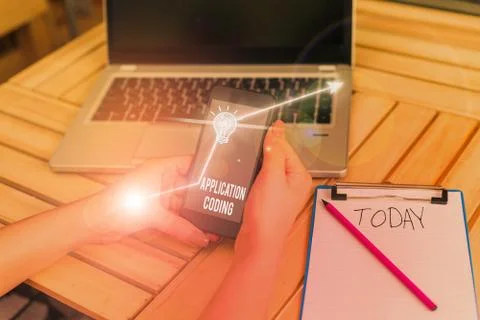 Word writing text Application Coding. Business concept for process by which a Foto stock