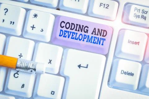 Word writing text Coding And Development. Business concept for Programming Stock Photos