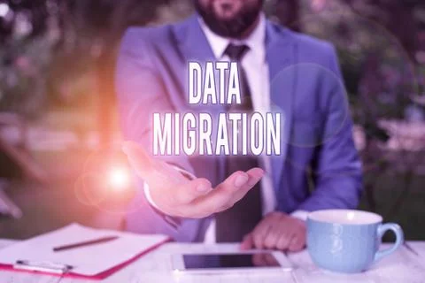 Word writing text Data Migration. Business concept for process of transferring Foto stock